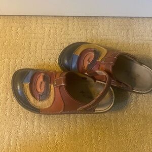 Women’s size 36 clogs. Multicolored.